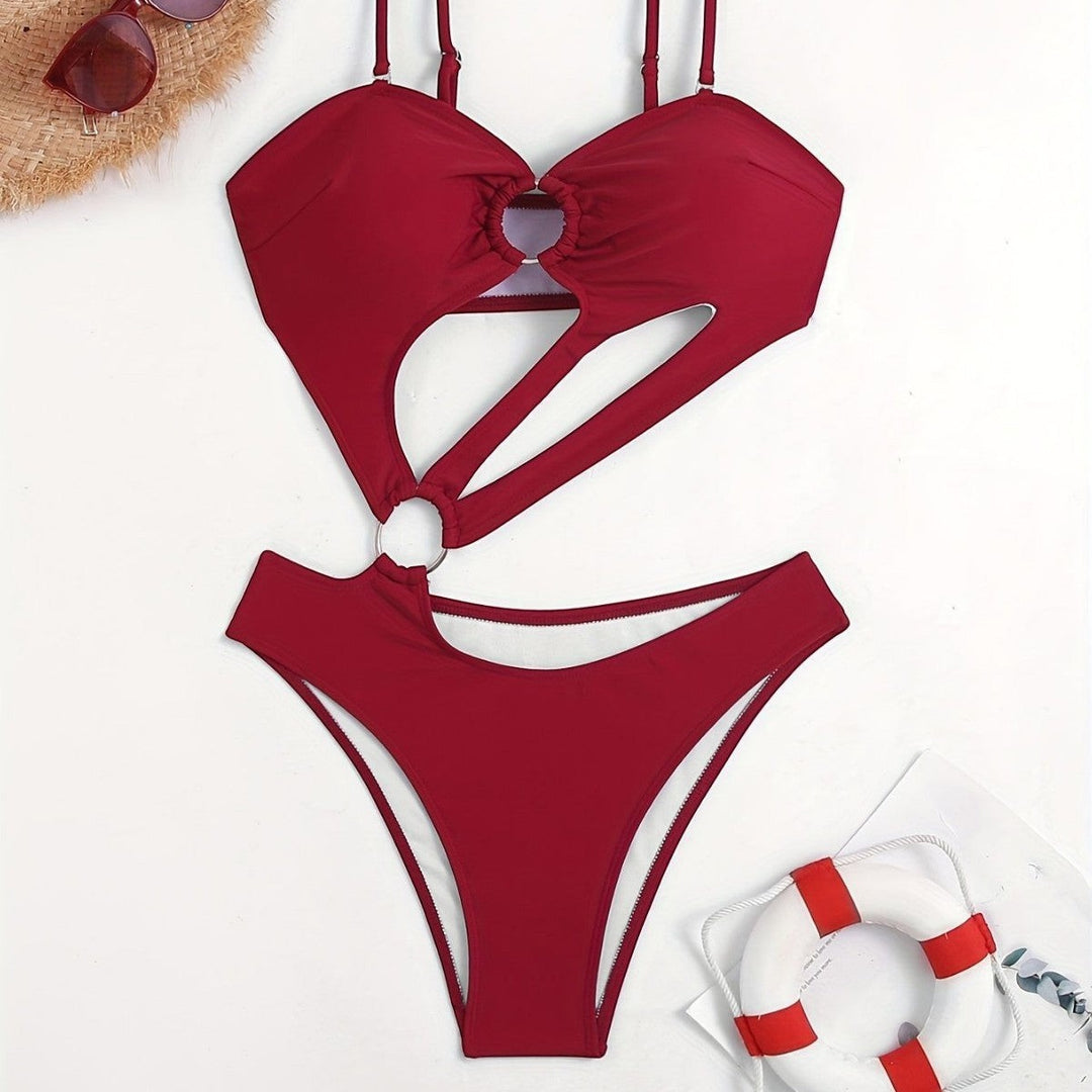 Sea Dragon Dreams red high-waist bikini set with cut-out details, ring hardware, and double straps.