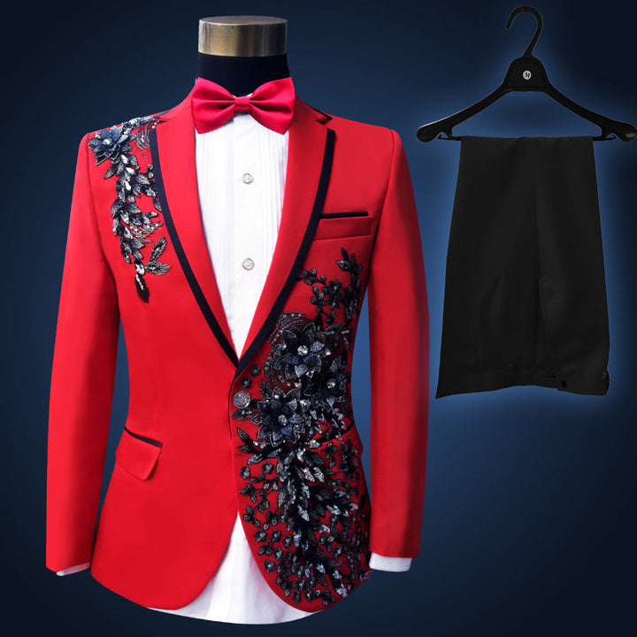 Sea Dragon Dreams red slim-fit tuxedo blazer with black floral embroidery, matching black trousers, and a red bowtie.