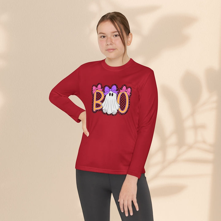 Sea Dragon Dreams youth long sleeve red Halloween shirt featuring a ghost graphic with Boo lettering on a young girl