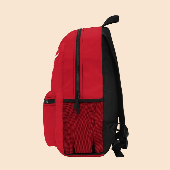 Sea Dragon Dreams red patriotic heart backpack with side mesh pocket and black zipper details, side view.
