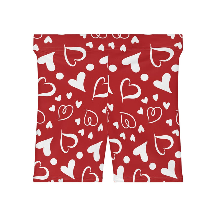 Sea Dragon Dreams high-waisted biker shorts in red with a white hand-drawn heart pattern and faux suede finish.