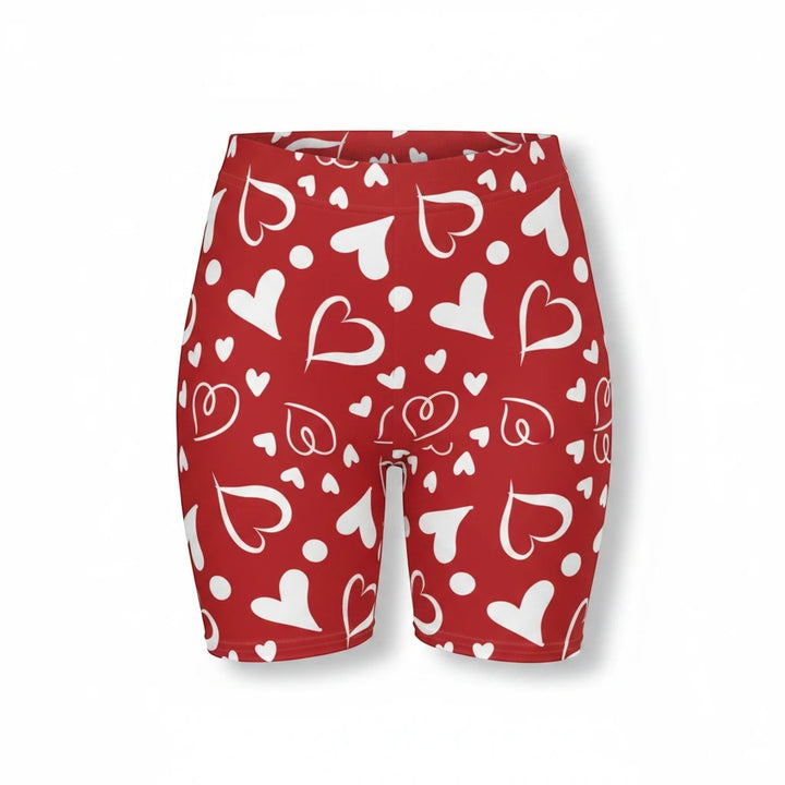 Sea Dragon Dreams high-waisted red biker shorts with a white heart pattern, made from moisture-wicking stretchy fabric.