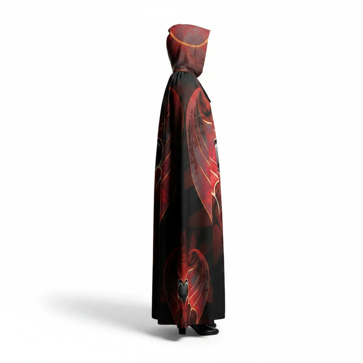 Sea Dragon Dreams unisex hooded cloak in red and black scuba fabric with heart-themed artwork and a flowing silhouette.