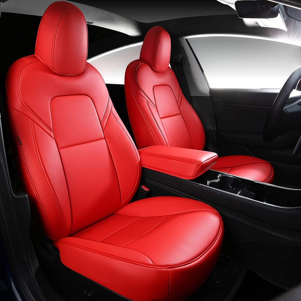 Sea Dragon Dreams red leather seat covers installed in a Tesla Model 3 or Model Y interior for a custom look.