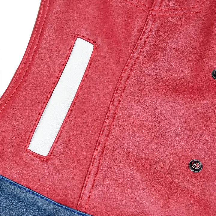 Sea Dragon Dreams women's motorcycle leather vest in red with white pocket accents and navy blue leather trim