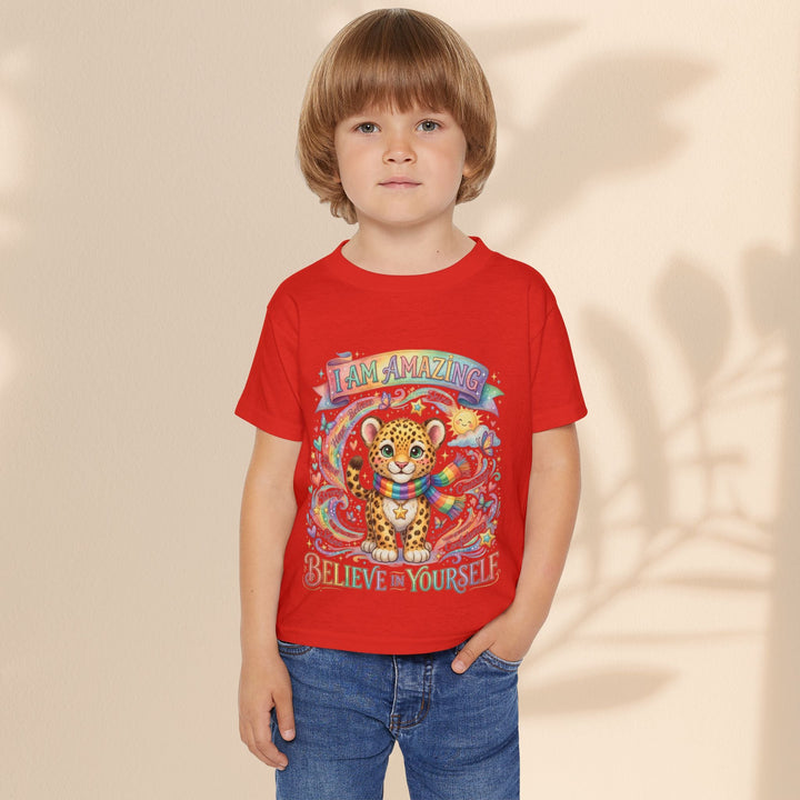 Sea Dragon Dreams toddler red cotton t-shirt with a cute leopard, rainbow, and I Am Amazing affirmation graphic.