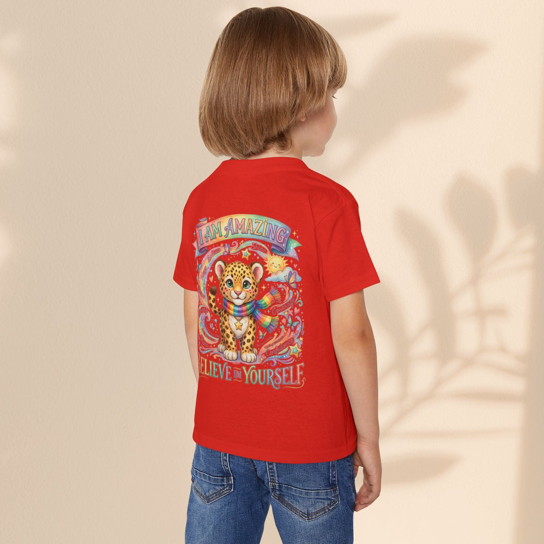 Sea Dragon Dreams red cotton toddler t-shirt featuring a cute leopard with a rainbow scarf and empowering text.