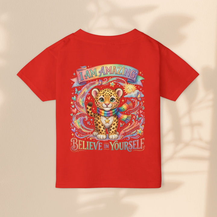 Sea Dragon Dreams red cotton toddler t-shirt with a cute leopard, rainbow scarf, and I Am Amazing affirmation graphic.