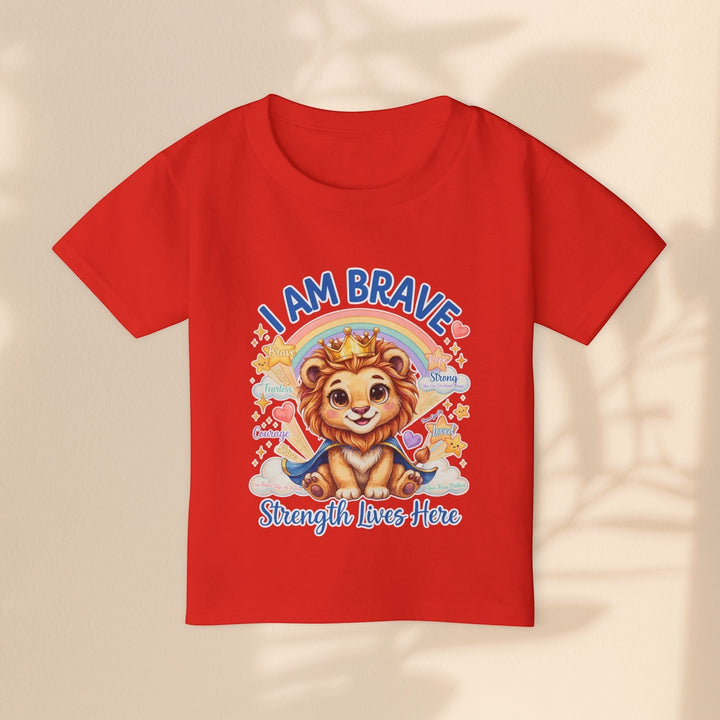 Sea Dragon Dreams red toddler t-shirt with Leo Lion graphic, crown, rainbow, and I Am Brave text in 100% cotton.