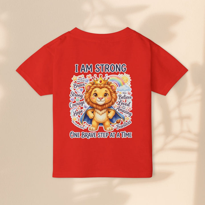 Sea Dragon Dreams red toddler t-shirt featuring a courageous lion graphic with the affirmation I Am Strong.
