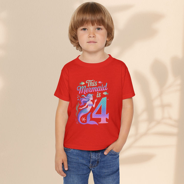 Sea Dragon Dreams red toddler t-shirt with This Mermaid Is 4 birthday graphic worn by a young child.