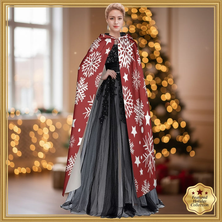 Sea Dragon Dreams unisex hooded cloak in red with white snowflake print, worn over a black evening gown.