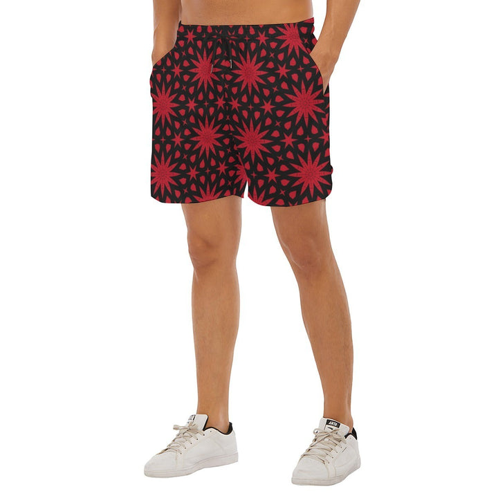 Sea Dragon Dreams men's polyester shorts featuring a bold red star pattern on a black background.