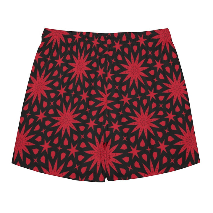 Sea Dragon Dreams men's polyester shorts featuring a bold red star pattern on a black background.