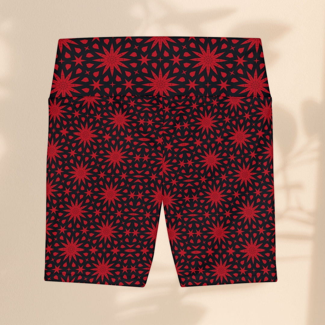 Sea Dragon Dreams red and black workout shorts featuring a repeating spiral star pattern in durable polyester fabric.