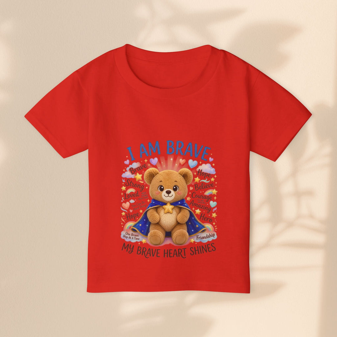 Sea Dragon Dreams red toddler t-shirt featuring a cute teddy bear in a cape with the text I Am Brave and affirmations.