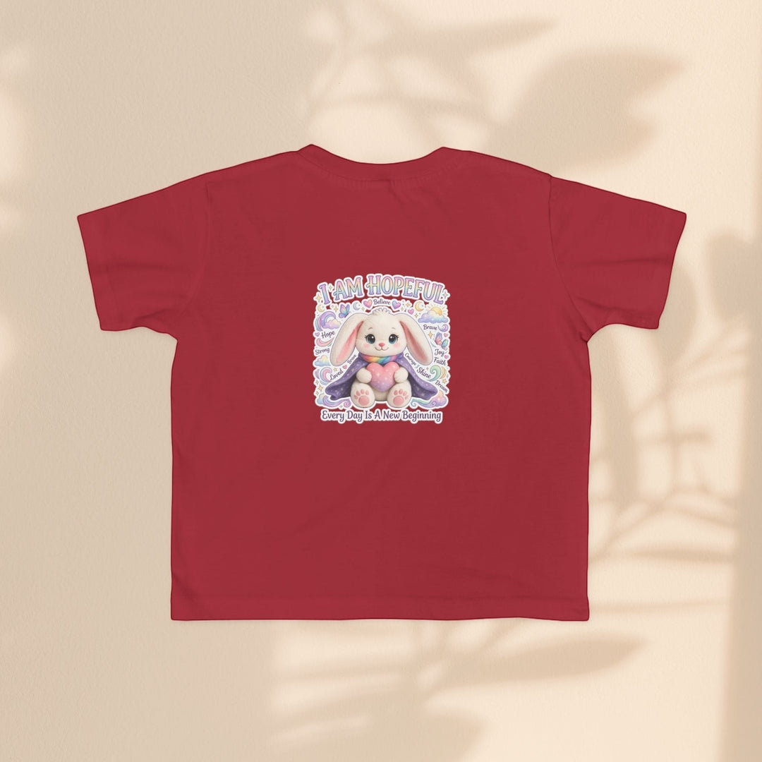 Sea Dragon Dreams red toddler t-shirt featuring the Brave Buddies Hope Bunny graphic with I Am Hopeful text.