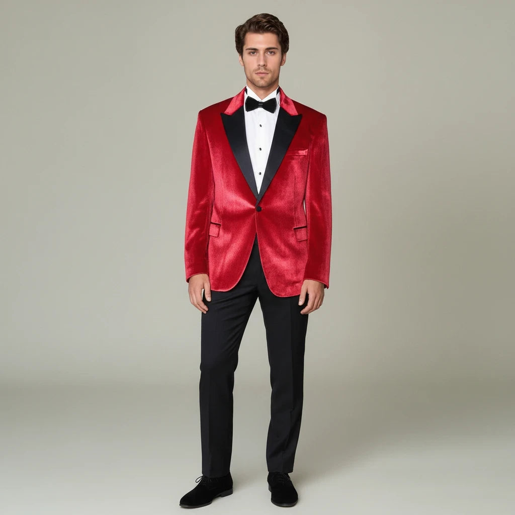 Sea Dragon Dreams Wessi red velvet tuxedo blazer with black peak lapels worn by a man with a black bow tie and trousers.