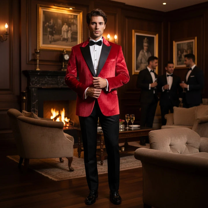 Sea Dragon Dreams Wessi red velvet tuxedo blazer with peak lapels worn by a man in a formal lounge setting.