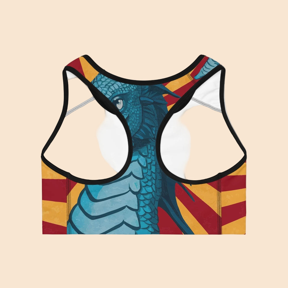 Sea Dragon Dreams red and yellow striped sports bra featuring a blue dragon illustration on the back racerback panel.
