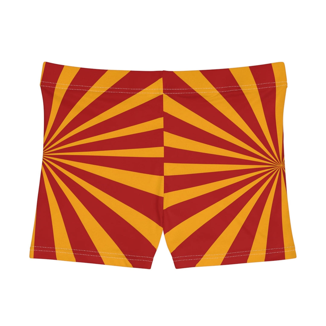 Sea Dragon Dreams women's skinny fit shorts in a vibrant red and yellow sunburst pattern with a faux suede finish.