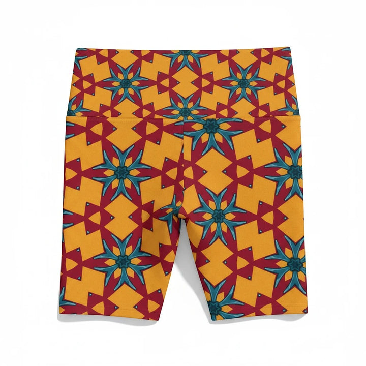 Sea Dragon Dreams women's workout shorts in a vibrant red and yellow geometric floral pattern made of polyester.