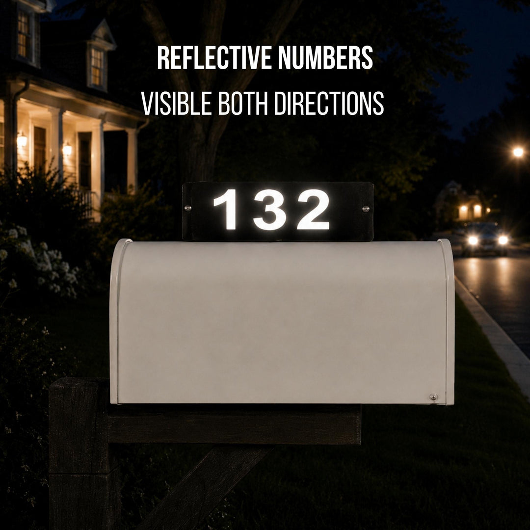 Sea Dragon Dreams personalized mailbox topper with reflective house numbers glowing at night on a rural mailbox