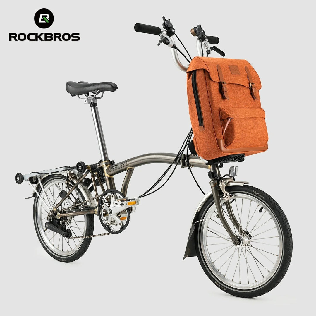 Sea Dragon Dreams ROCKBROS orange polyester vintage folding bike backpack mounted on a bicycle front frame