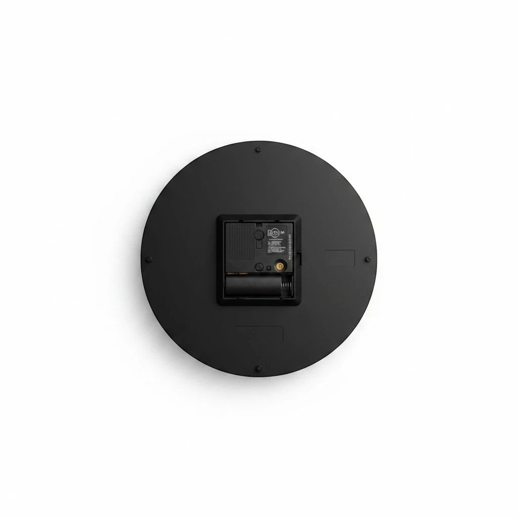 Back view of a Sea Dragon Dreams round acrylic wall clock showing the black casing, battery compartment, and keyhole.