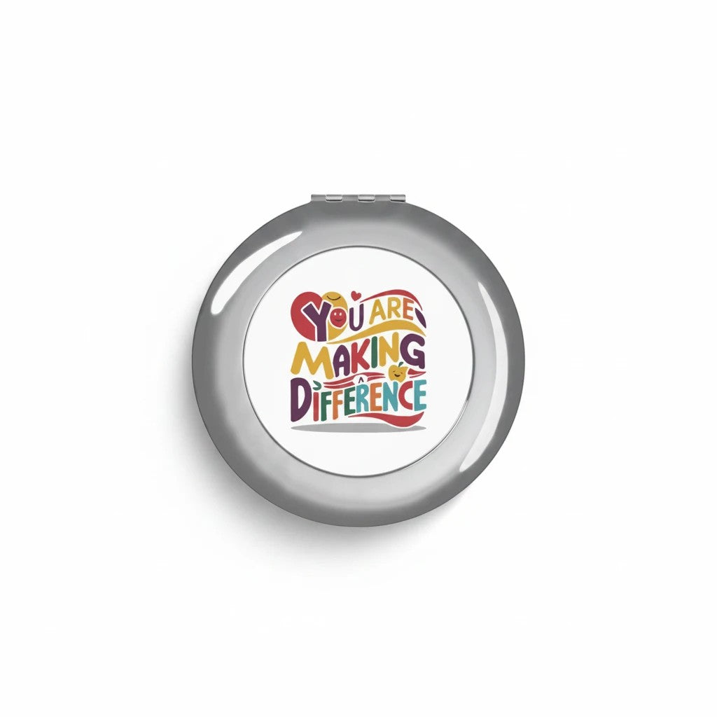 Sea Dragon Dreams round metal compact travel mirror with You Are Making a Difference text design on white insert