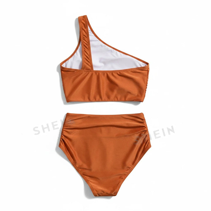 Sea Dragon Dreams rust orange one-shoulder bikini set with high-waisted bottoms in soft stretch fabric