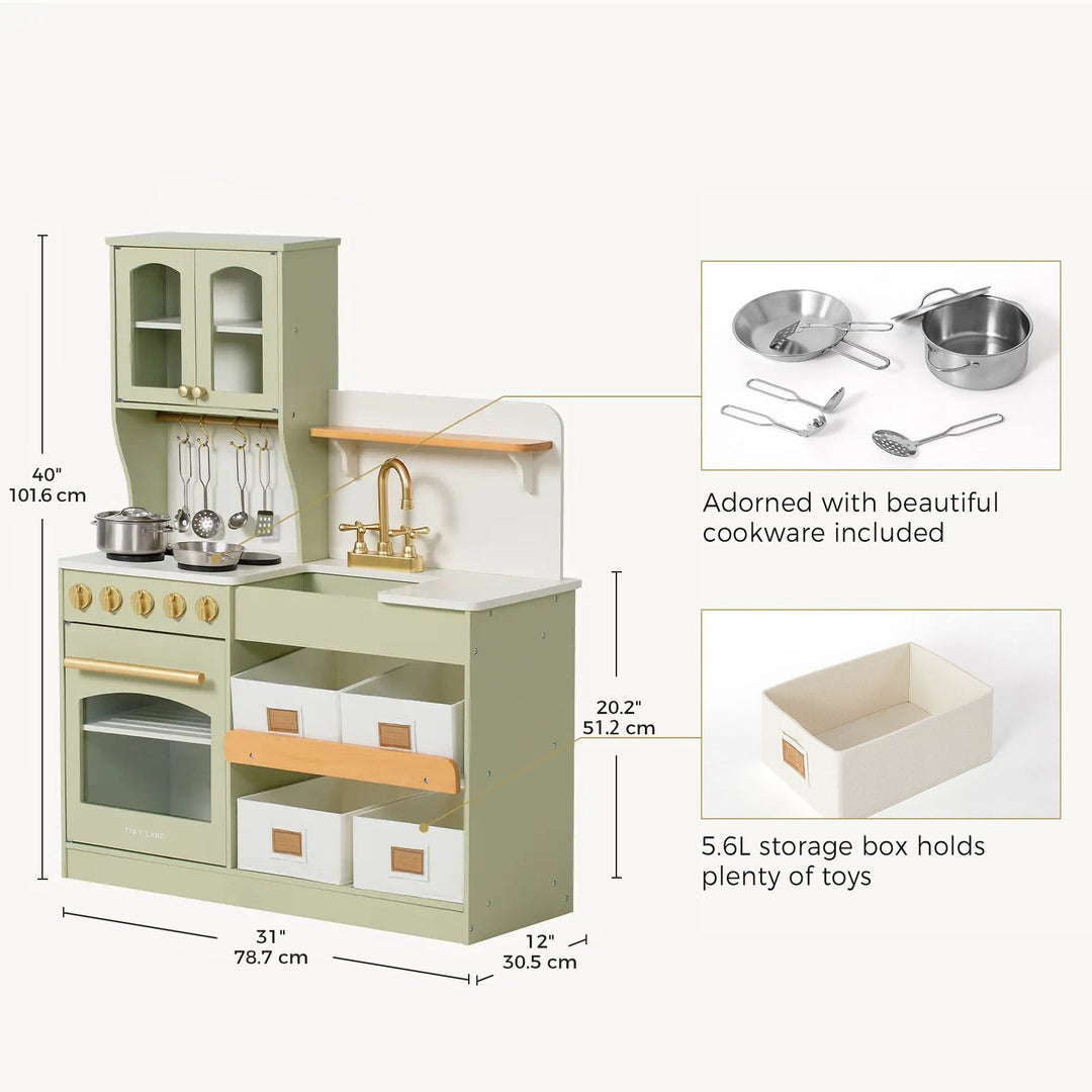 Sea Dragon Dreams Tiny Land wooden play kitchen in sage green with storage bins, faucet, and included metal cookware.