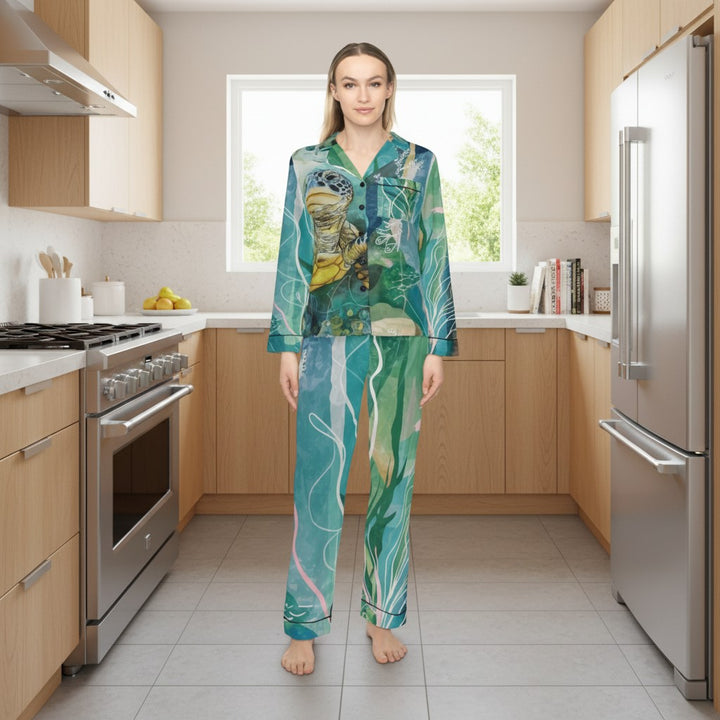 Sea Dragon Dreams women's satin pajamas with a sea turtle and underwater plant print. Features a notch lapel, button front, and adjustable drawstring waist.