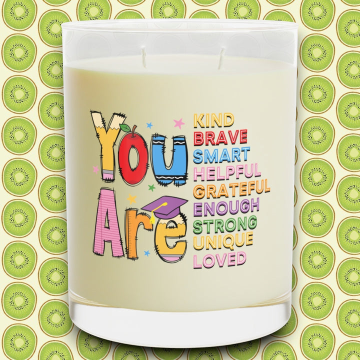 Sea Dragon Dreams 11oz soy wax scented candle in a glass jar with a colorful You Are Special graphic print