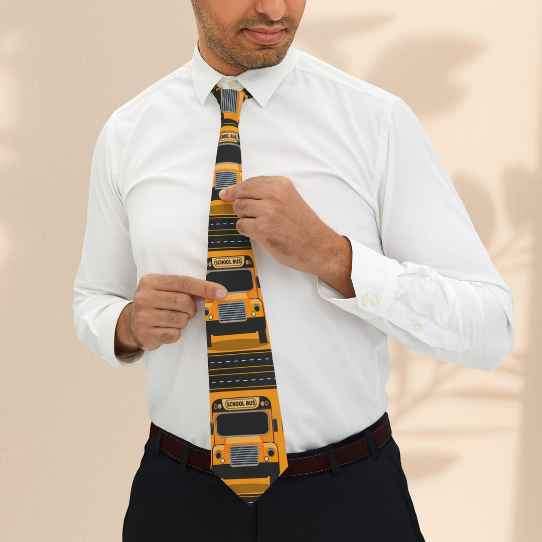Sea Dragon Dreams school bus driver necktie with yellow bus print on a man wearing a white shirt and black trousers