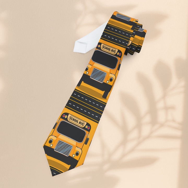 Sea Dragon Dreams school bus driver necktie in yellow with a satin finish and repeating school bus print.