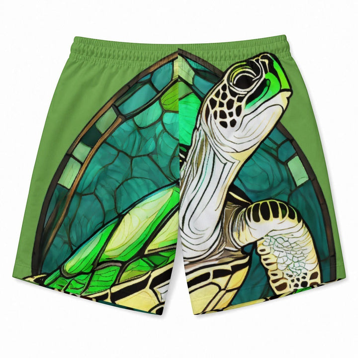 Sea Dragon Dreams men's Hawaiian shorts featuring a green sea turtle in a stained-glass style print on lightweight fabric.