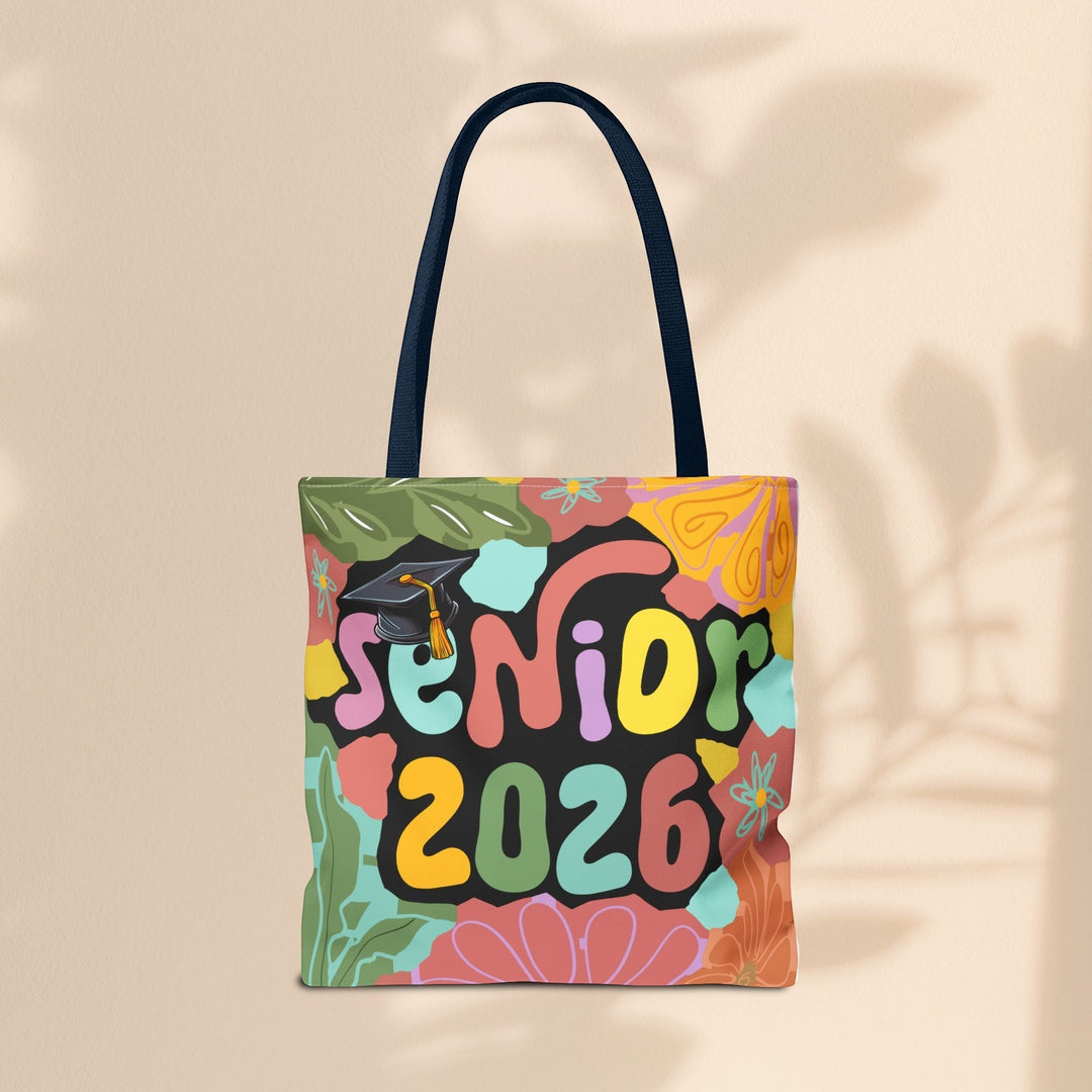 Sea Dragon Dreams Senior 2026 tote bag with colorful floral patterns and graduation cap graphic on polyester canvas.