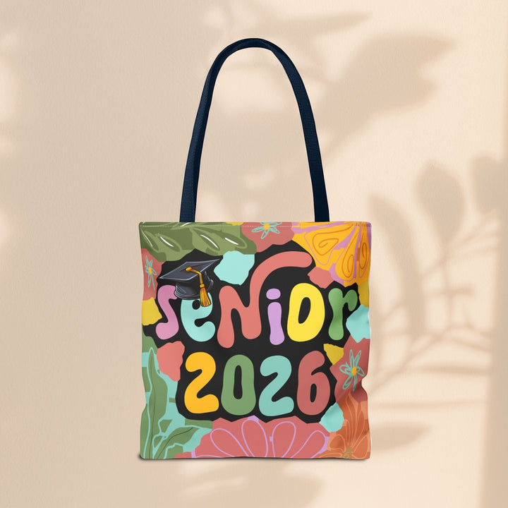 Sea Dragon Dreams Senior 2026 tote bag with colorful floral patterns and graduation cap graphic on polyester canvas.
