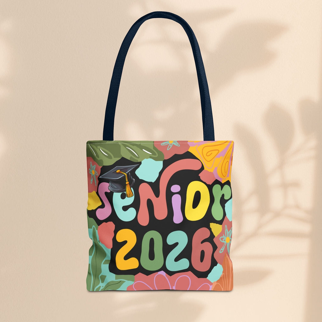 Sea Dragon Dreams Senior 2026 tote bag with colorful retro typography, graduation cap, and floral patterns.