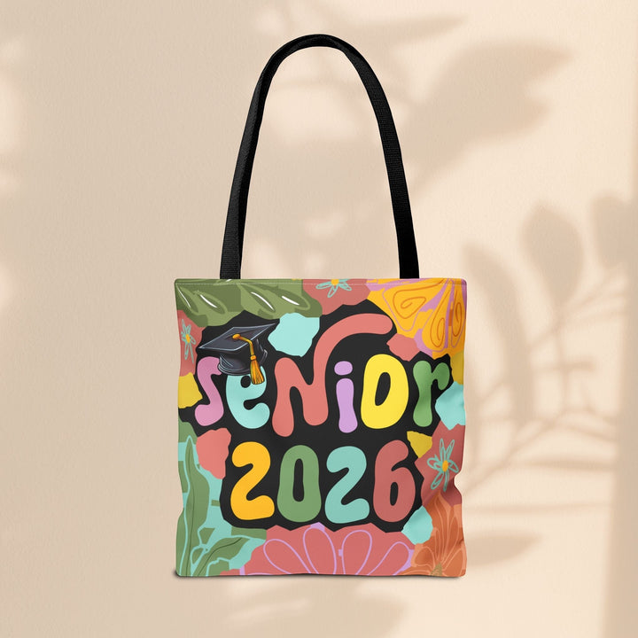 Sea Dragon Dreams Senior 2026 tote bag with colorful floral patterns and a graduation cap graphic on polyester canvas.