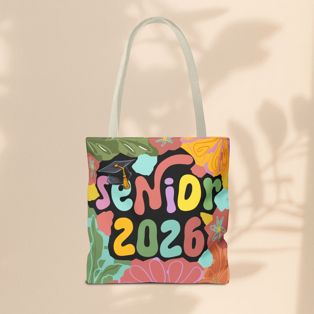 Sea Dragon Dreams Senior 2026 tote bag with colorful floral patterns and a graduation cap graphic on polyester canvas.