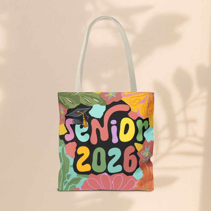 Sea Dragon Dreams Senior 2026 tote bag with colorful floral patterns and a graduation cap graphic on polyester canvas.