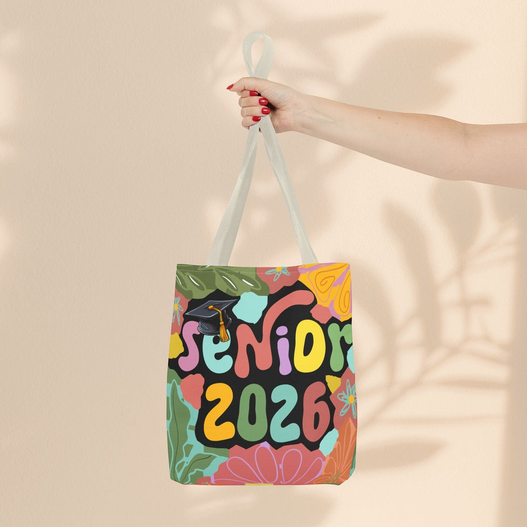 Sea Dragon Dreams Senior 2026 tote bag with colorful floral and graduation cap graphic on a durable polyester canvas.