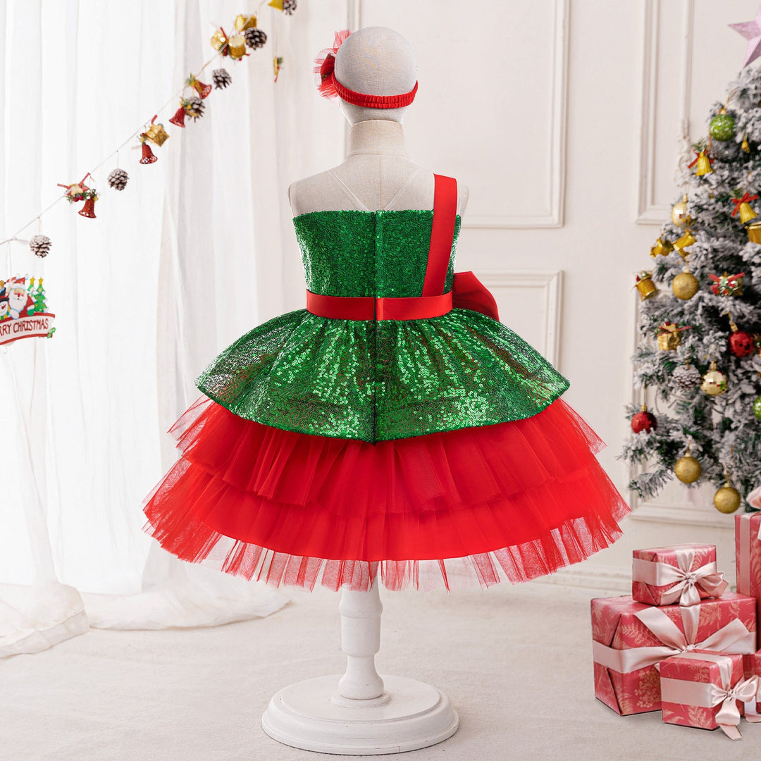 Sea Dragon Dreams girls' red and green sequin Christmas dress with layered tulle skirt and matching festive headband.