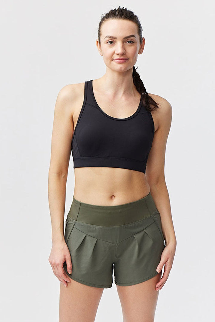 Sea Dragon Dreams Sheva women's olive green high-rise running shorts with pleated detail and a flat knit waistband.
