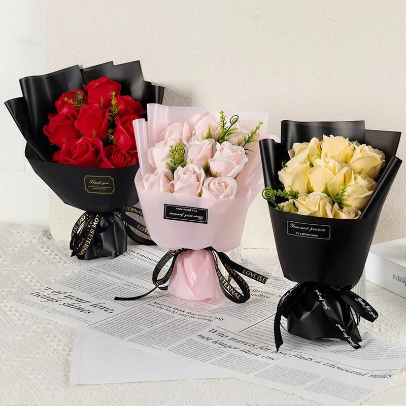 Sea Dragon Dreams artificial soap rose bouquets in red, pink, and champagne, wrapped in elegant paper with ribbons.