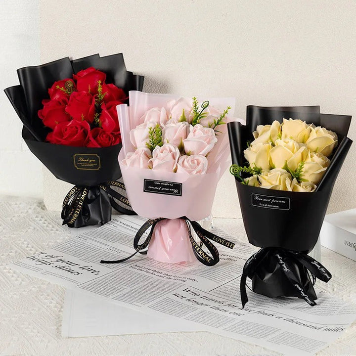 Sea Dragon Dreams artificial soap rose bouquets in red, pink, and champagne, wrapped in elegant paper with ribbons.