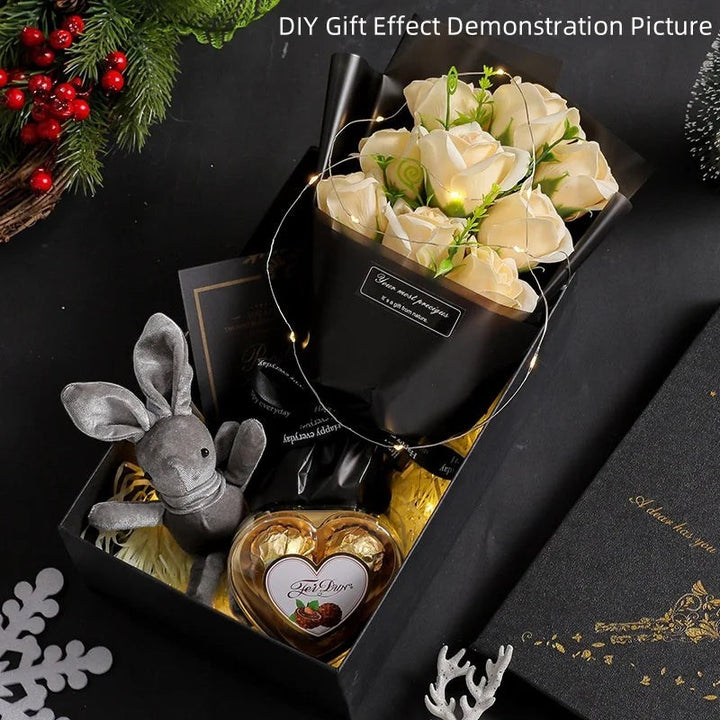 Sea Dragon Dreams champagne soap rose bouquet gift set with a plush bunny and chocolates in a black box