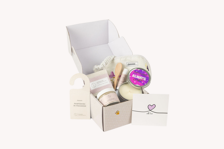 Sea Dragon Dreams spa gift box for nurses featuring lavender soap, clay mask, soy candle, lip balm, and eye mask.